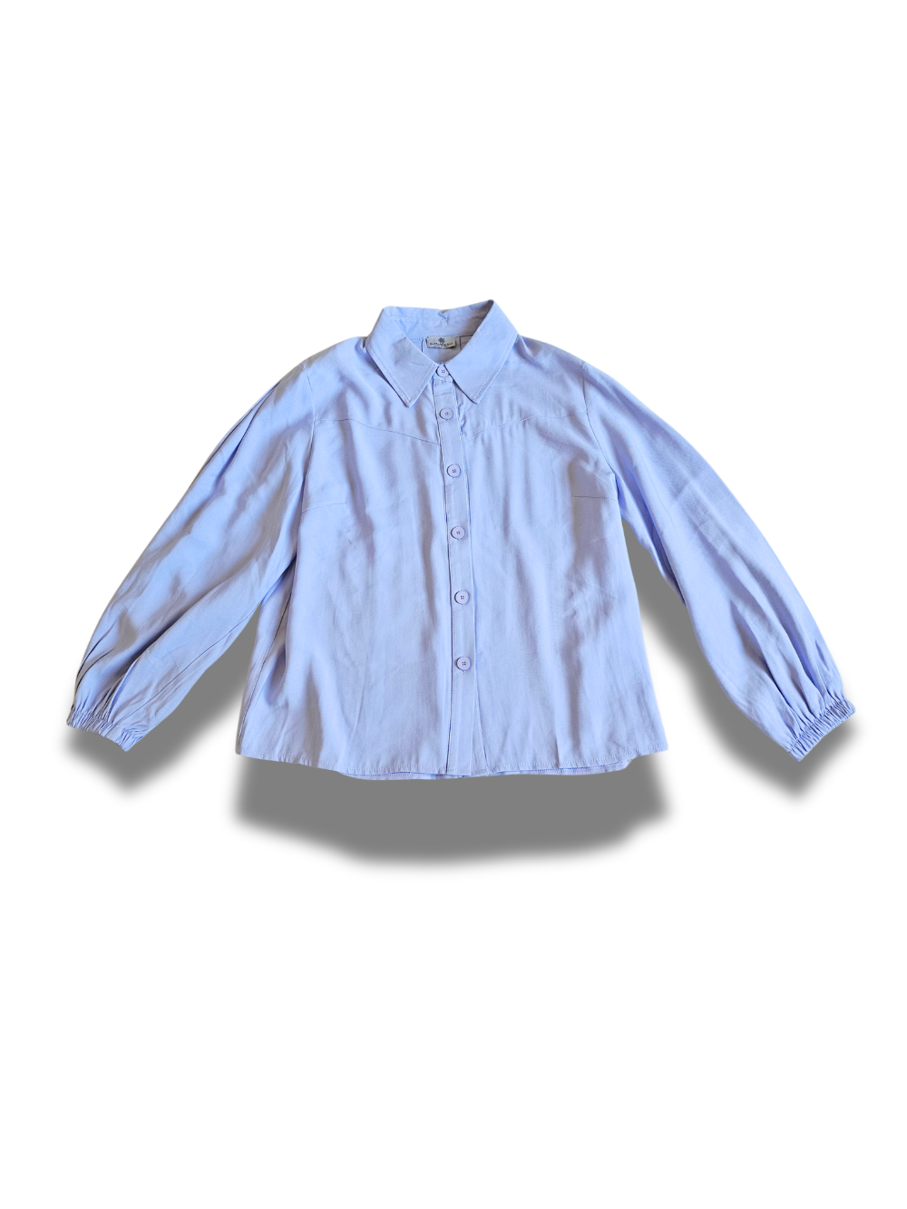 Soft viscose over shirt with a light, fluid drape.